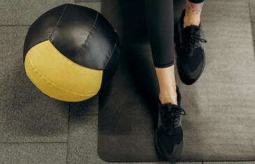 Member retention medicine ball mat woman stock column