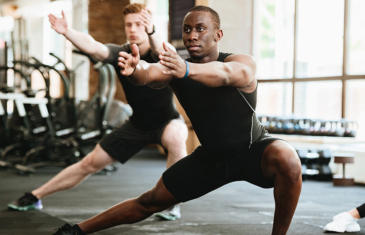 Personal Training Men Exercising Tai Chi Column