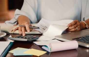 Strategy and finance woman calculating budget Freepik stock column