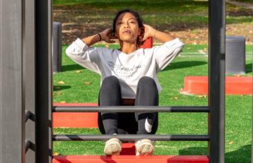 Wellness woman exercising outdoors unsplash column