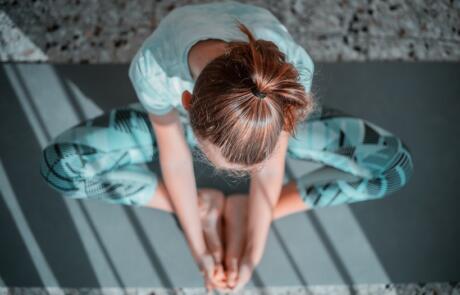 JWB report woman yoga unsplash column