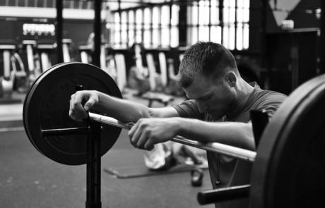 Technology Man Leaning On Barbell Column View