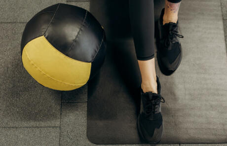 Member retention medicine ball mat woman stock column