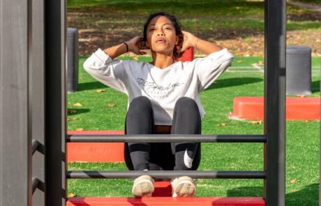 Wellness woman exercising outdoors unsplash column