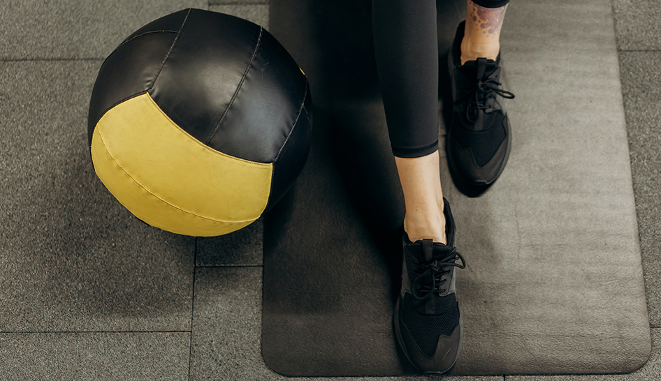 Member retention medicine ball mat woman stock column