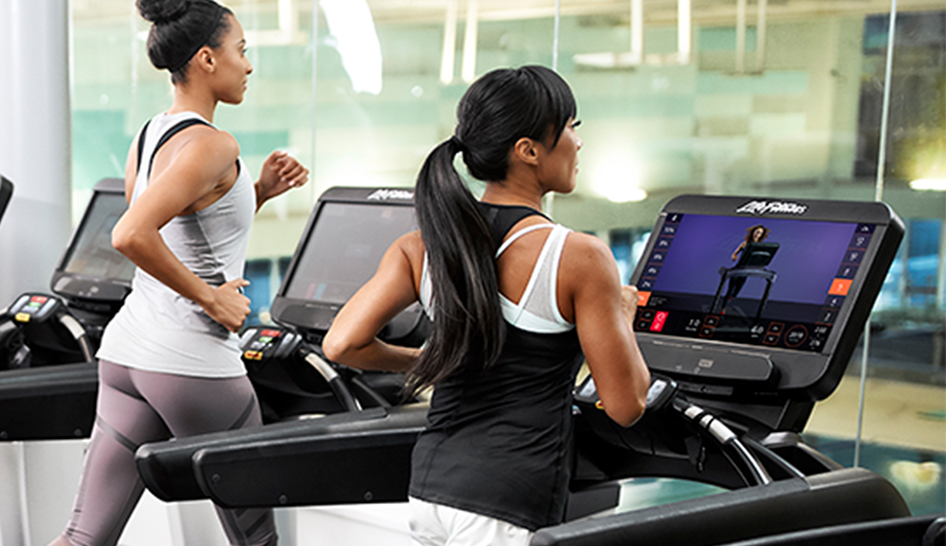 Technology Life Fitness exerciser on treadmill column