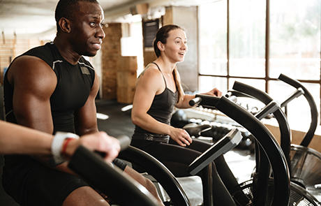 4 Reasons to Keep Going to the Gym During an Outbreak happy people equipment listing image