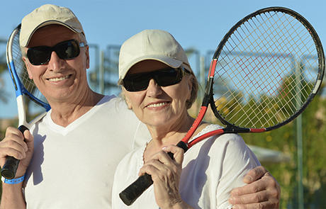 Wellness Seniors Playing Tennis